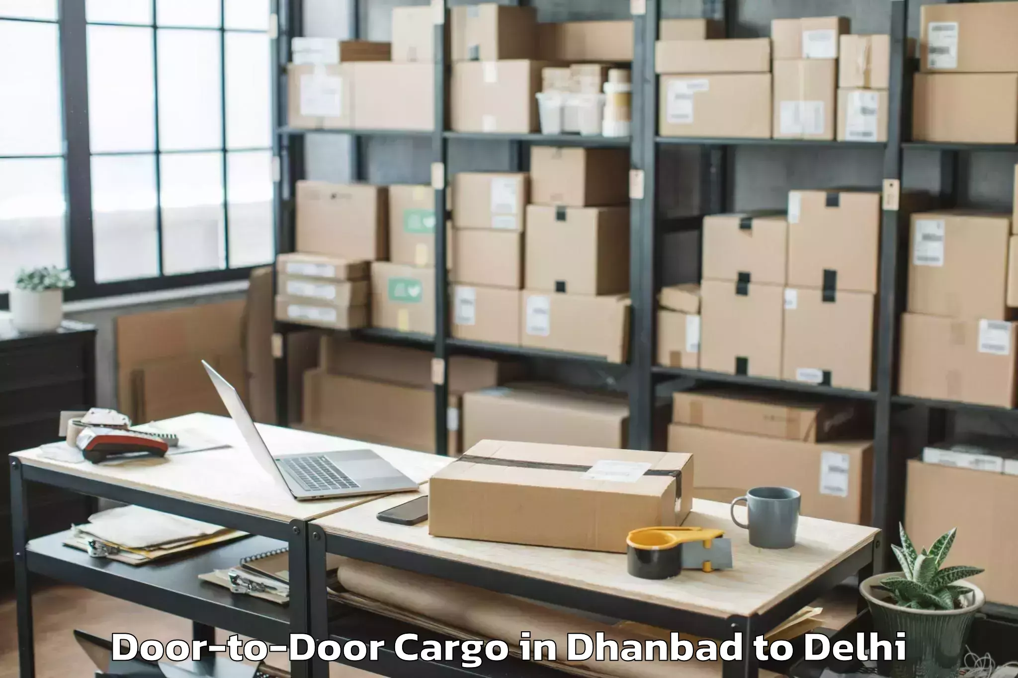 Quality Dhanbad to Vasant Square Mall Door To Door Cargo